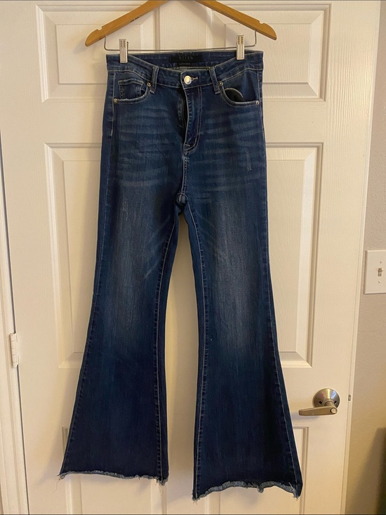 Risen Jeans Denim - High-Rise Dark Blue Flared Jeans with Raw Hem